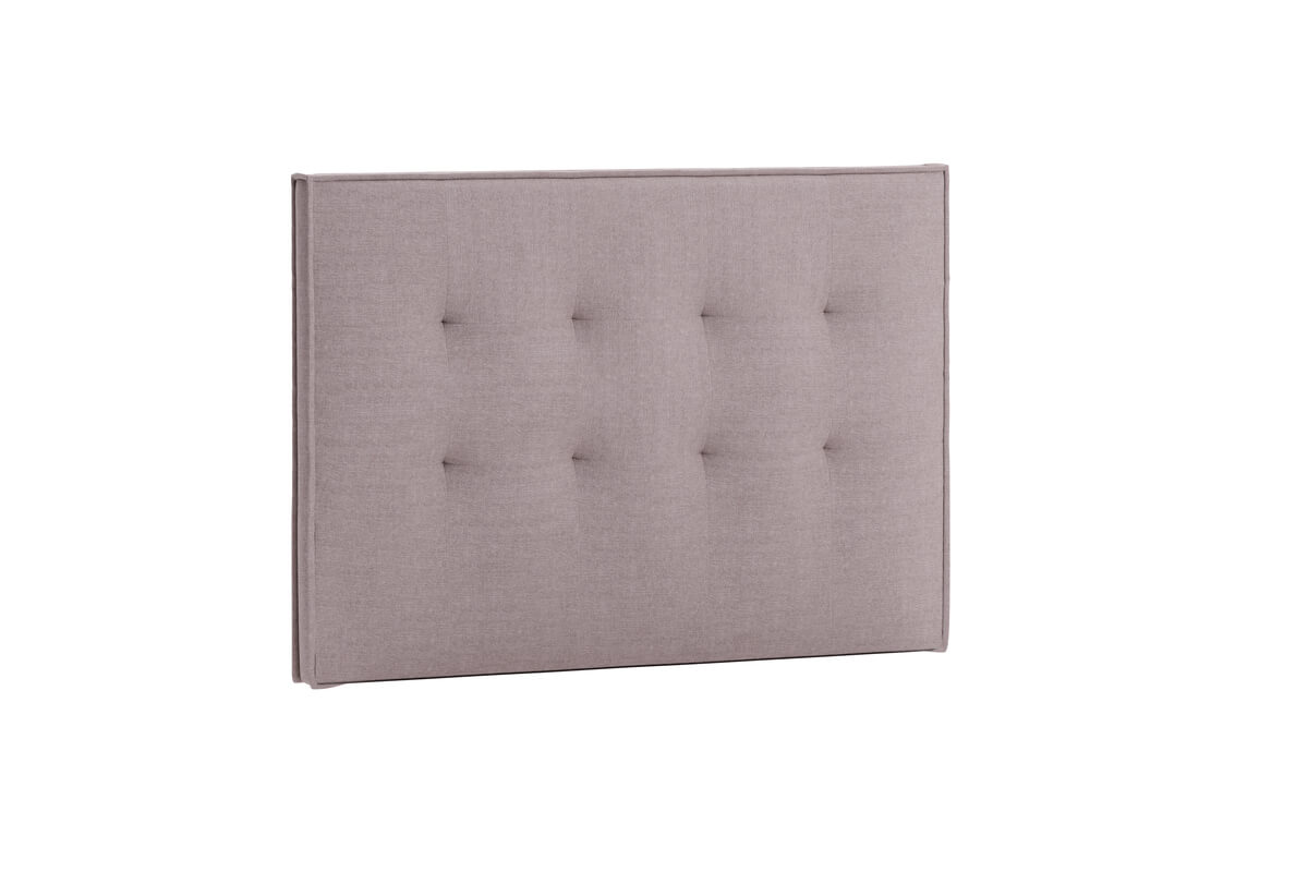 Sänggavel i ljusgrått tyg för modern sovrumsinredning.