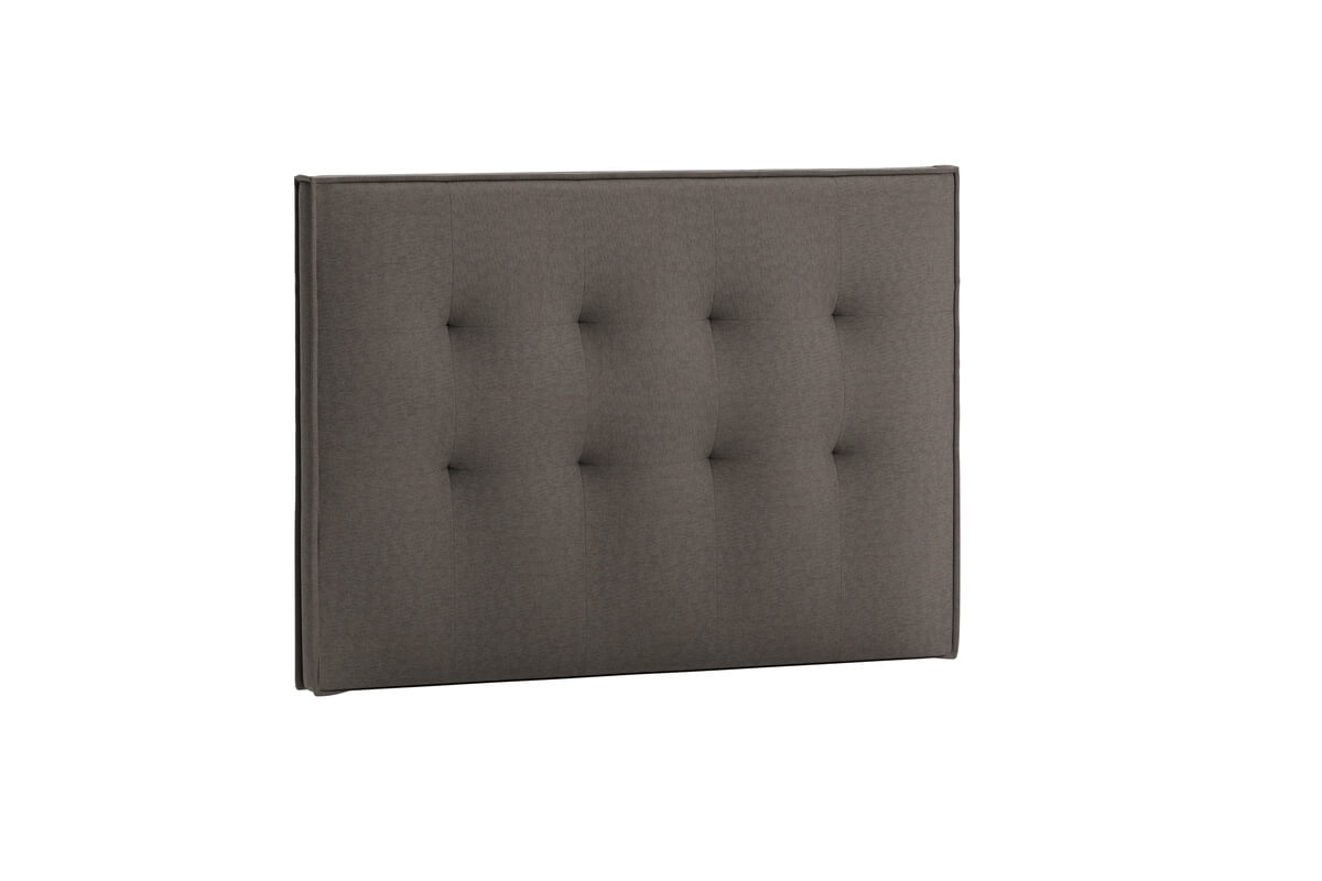 Sänggavel i mörkgrått tyg för modern sovrumsinredning.