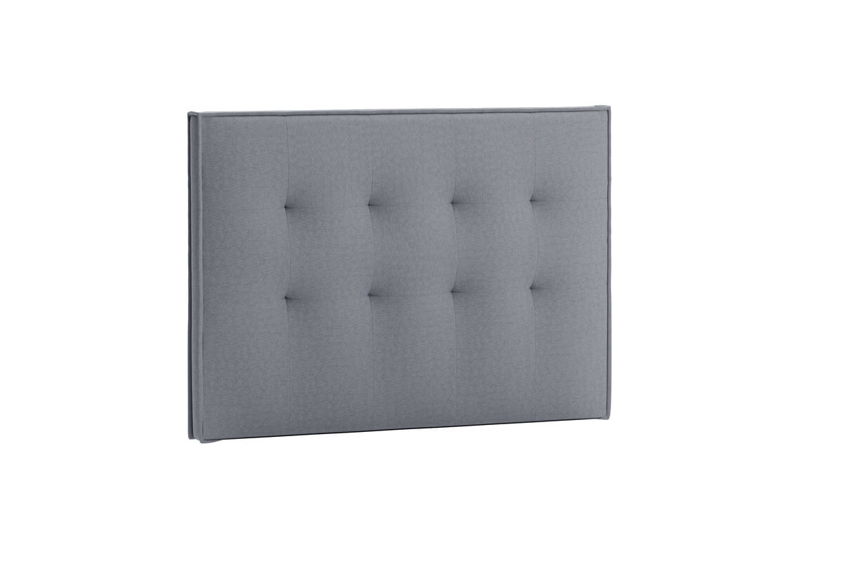 Sänggavel i grått tyg för modern sovrumsinredning.