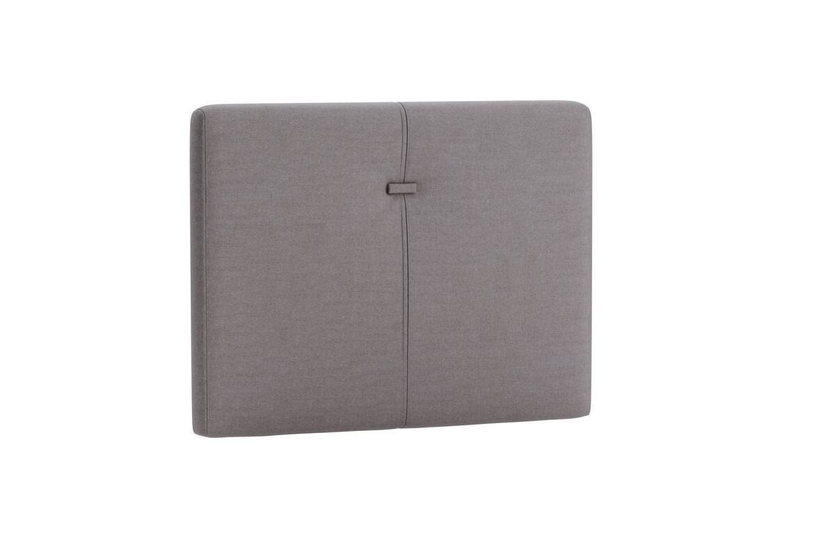 Sänggavel i grått tyg för modern sovrumsinredning.