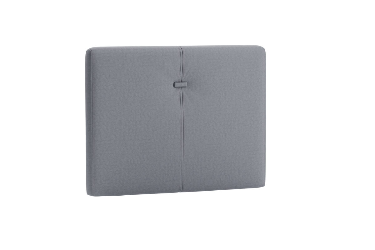 Sänggavel i grått tyg för modern sovrumsinredning.