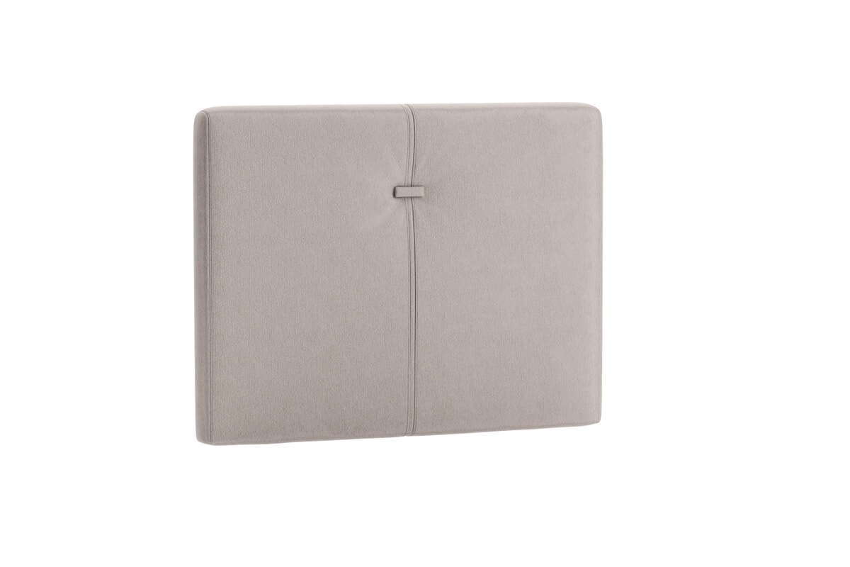 Sänggavel i ljusgrått tyg för modern sovrumsinredning.