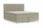 Sängram med beige klädsel och höga vertikala paneler.