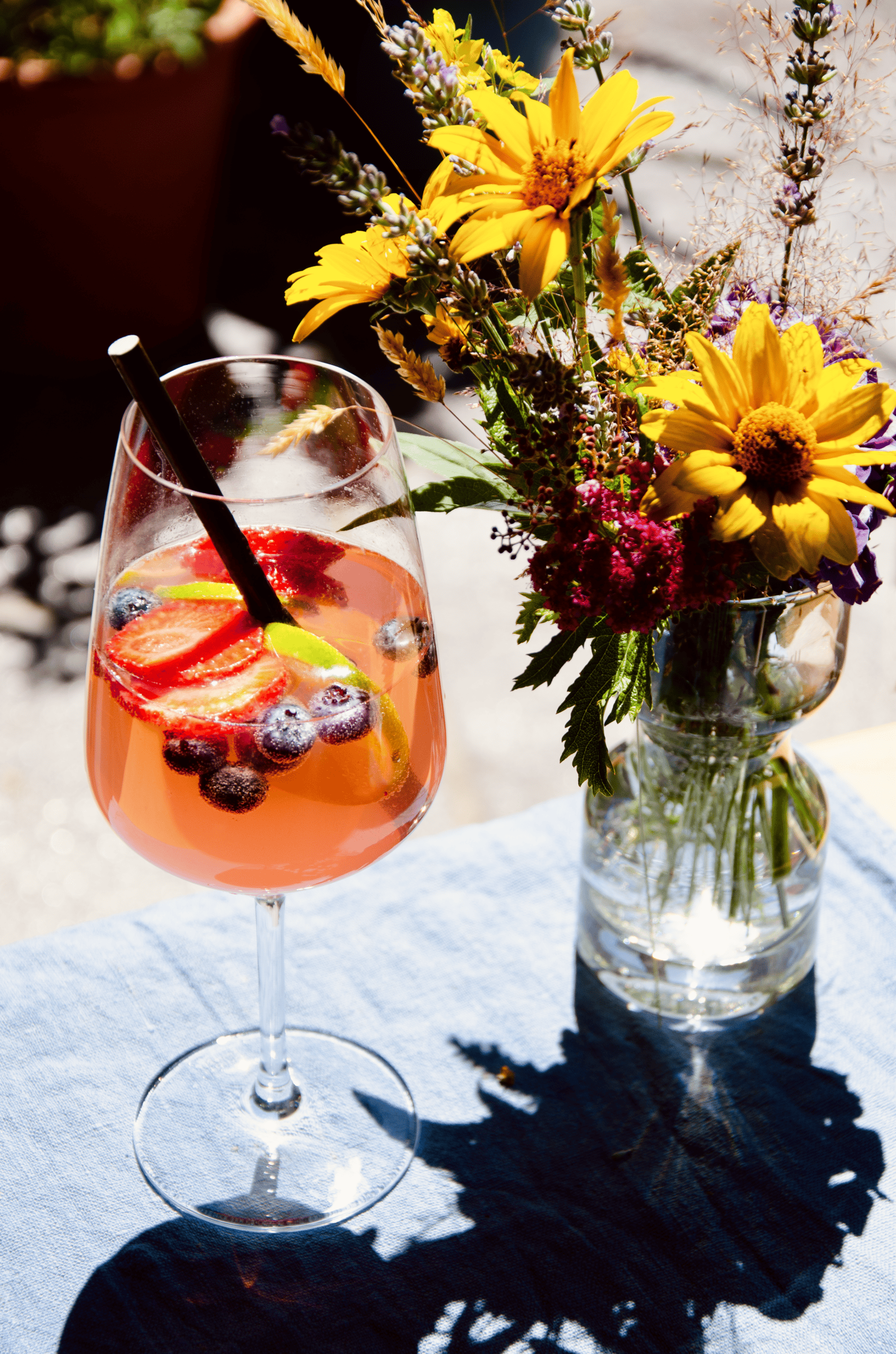 Handcrafted Berghugo aperitif with fresh garden herbs at Sass da Grüm in Ticino