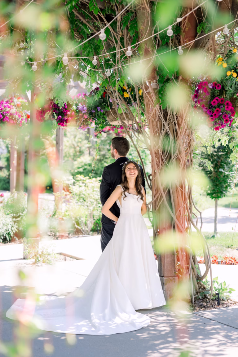 Bride and Groom having a first touch moment