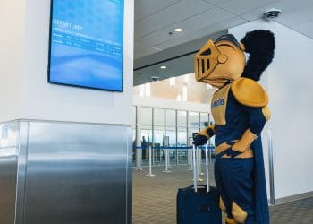 Lance the Lancer checking the flight schedule
