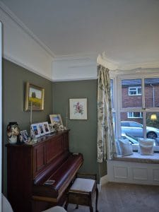 High-quality interior wall decorating with elegant cornicing and window treatments by S Bond Decorating.
