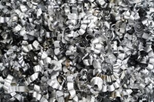 Pile of aluminium scrap metal ready for recycling and repurposing.
