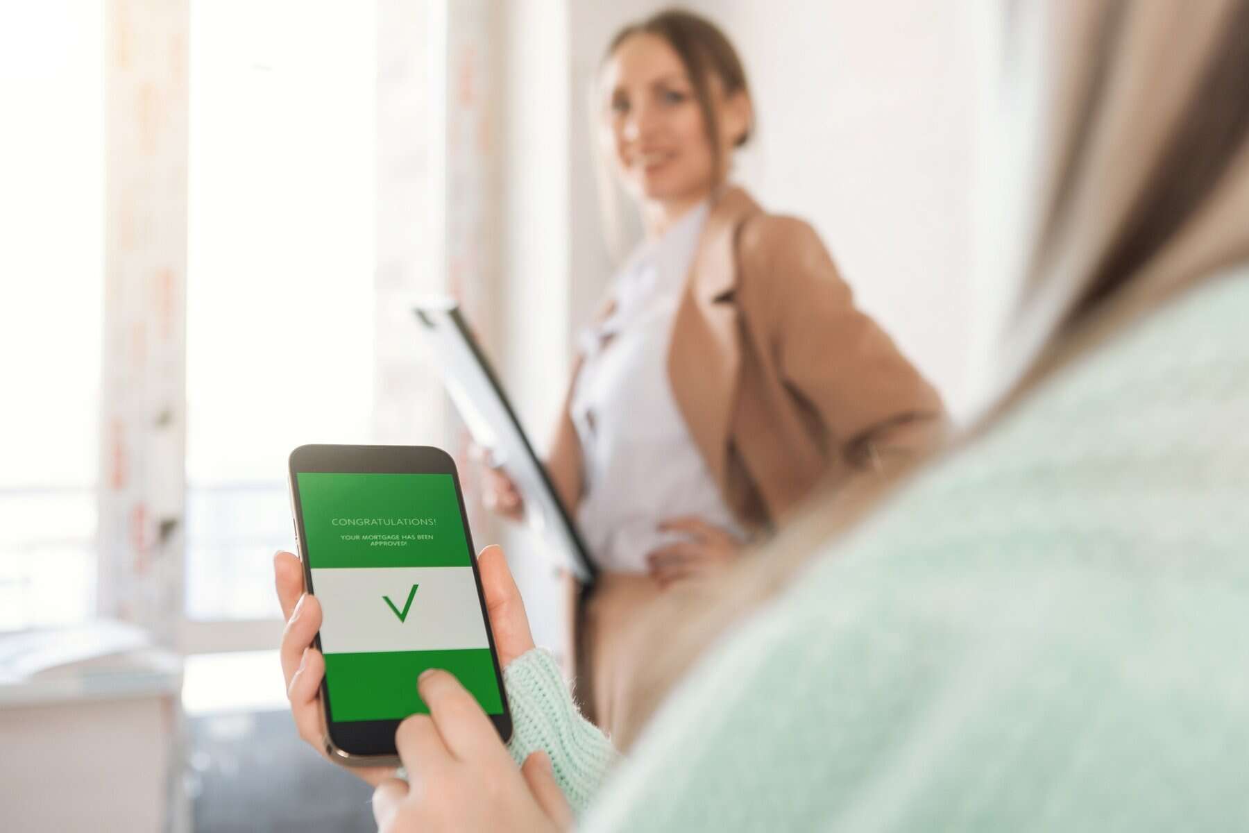 Mortgage approved online on a phone. Mortgage in internet.