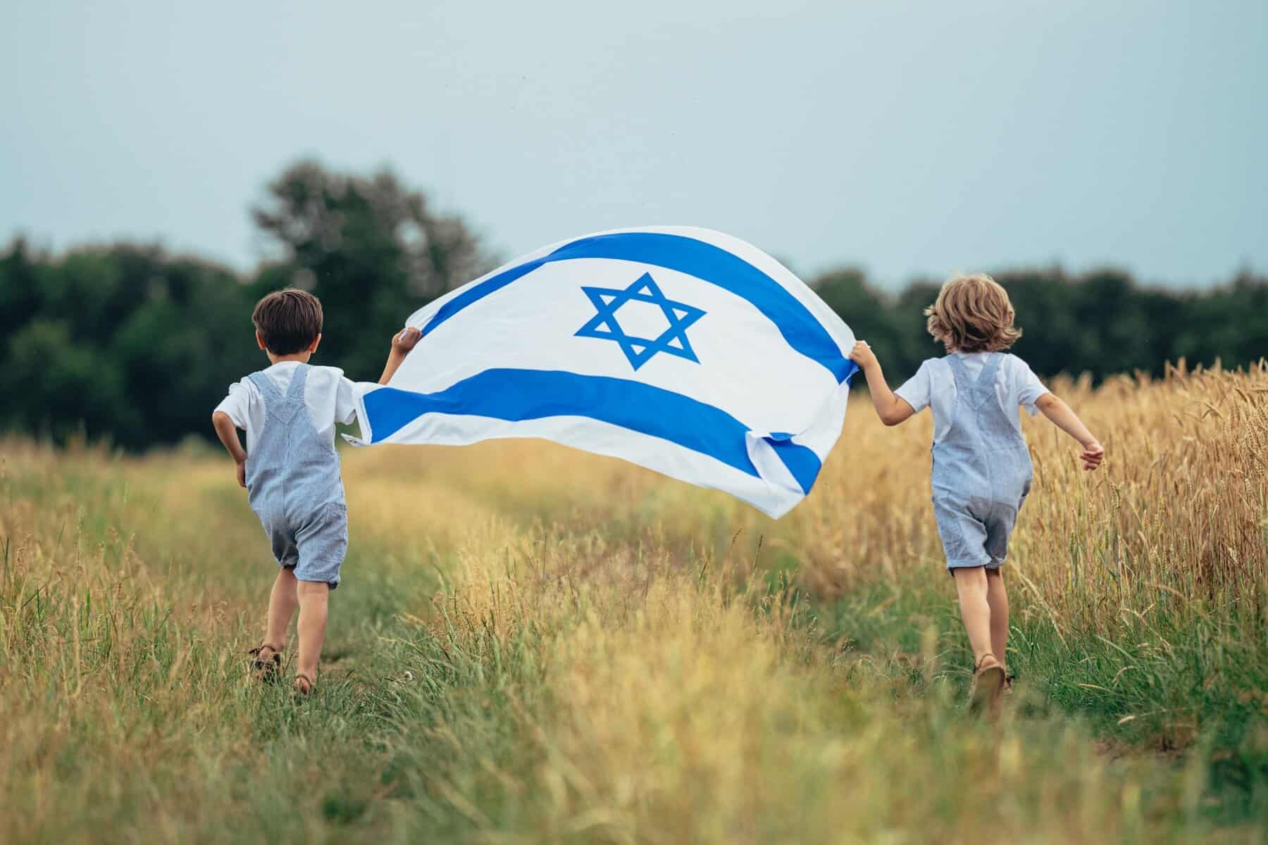 Happy Israeli Jewish Little Boys Runs With Israel National Flag. Independence