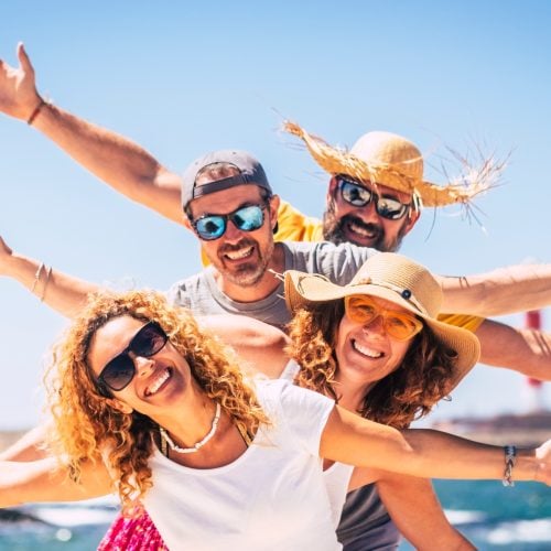 Group of happy people enjoy travel and summer holiday