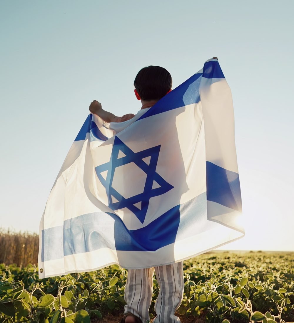 Happy Israeli Jewish Little Boy Jumping, Israel National Flag. Independence Day