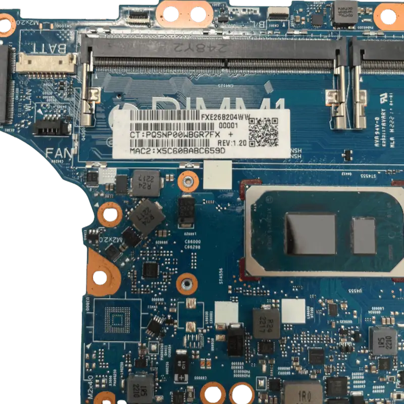 Carte mère d'ordinateur avec processeur, RAM et composants électroniques visibles, vue rapprochée pour réparation ou upgrade.