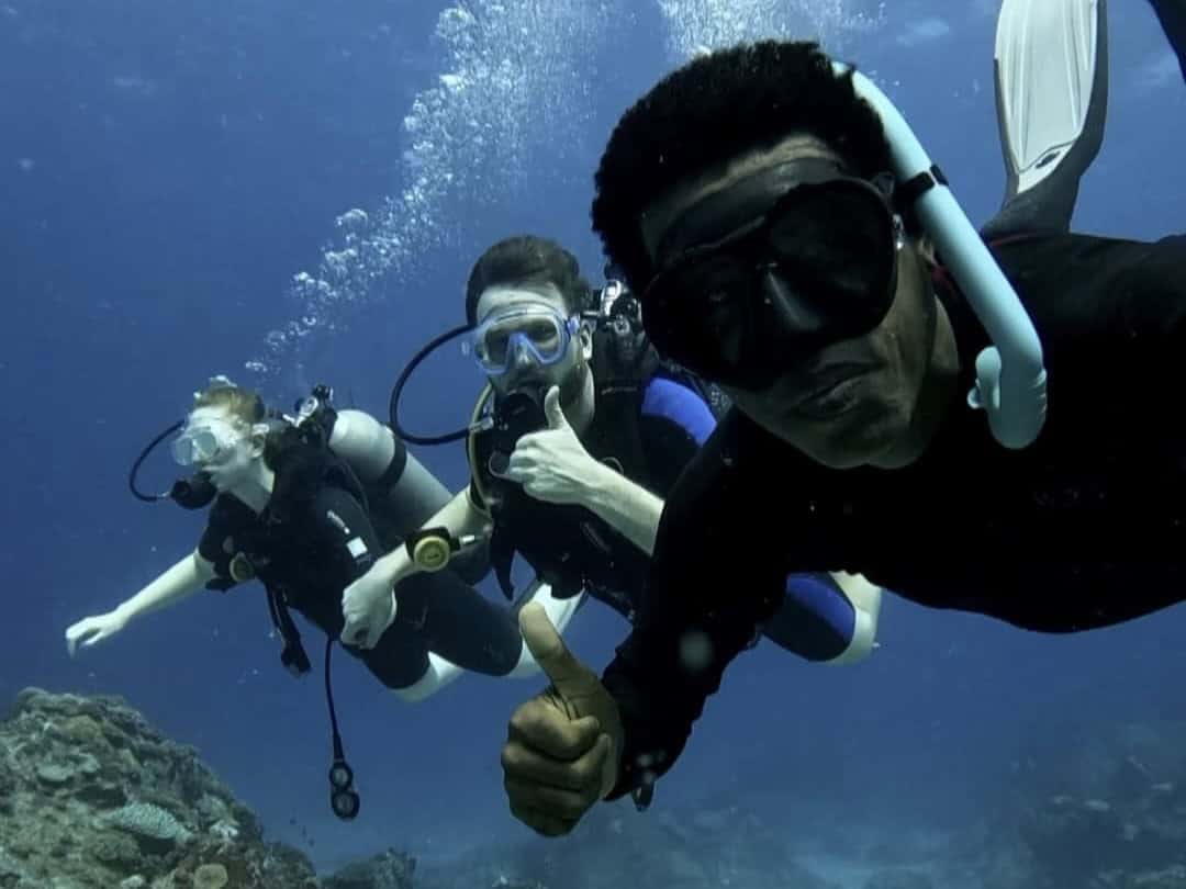 Snorkelers exploring coral reef on Zico Boat Excursions tour