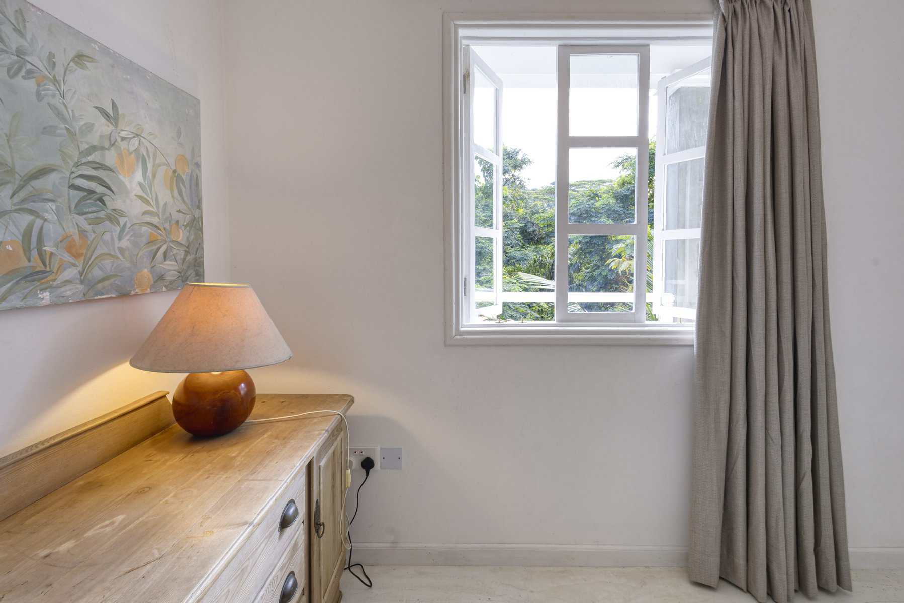 Katiti Lodge — bedroom with A/C and storage