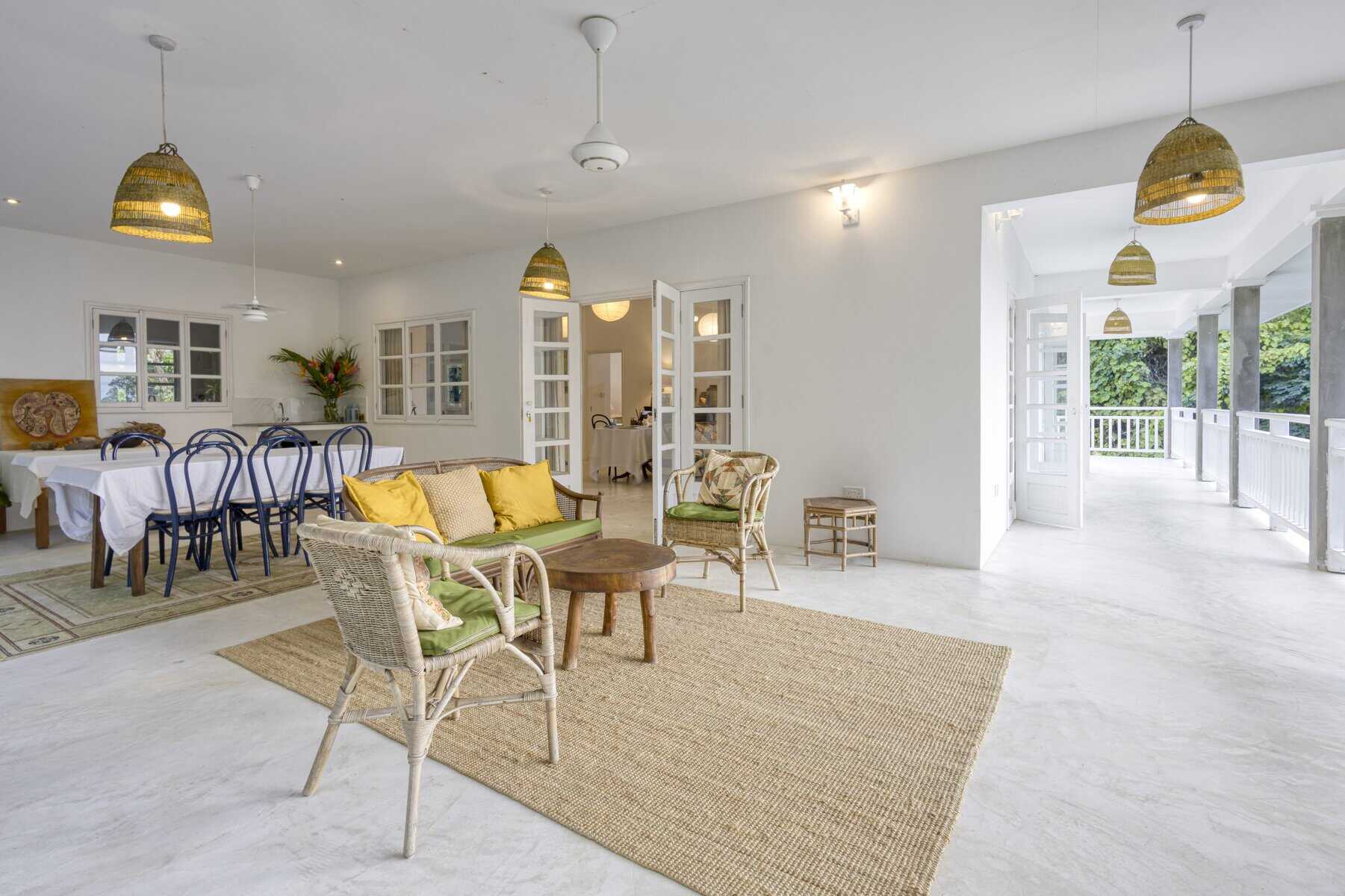 Katiti Lodge — living room opening to ocean-view terrace