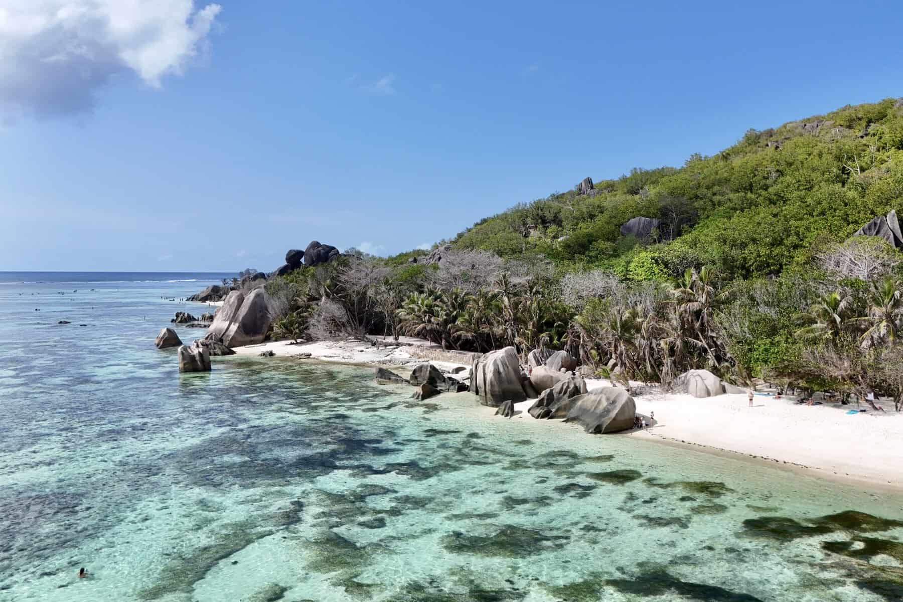 La Digue beaches aerial view with granite rocks and turquoise lagoon