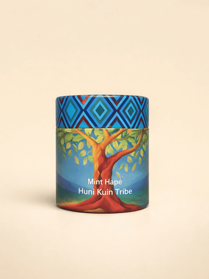 Mint Hapé, traditional indigenous snuff from the Huni Kuin tribe, featuring vibrant packaging with a colorful tree design and geometric patterns, representing cultural heritage and natural ingredients.