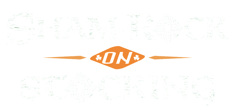 Festive shamrock design on Christmas stocking for St. Patrick's Day.