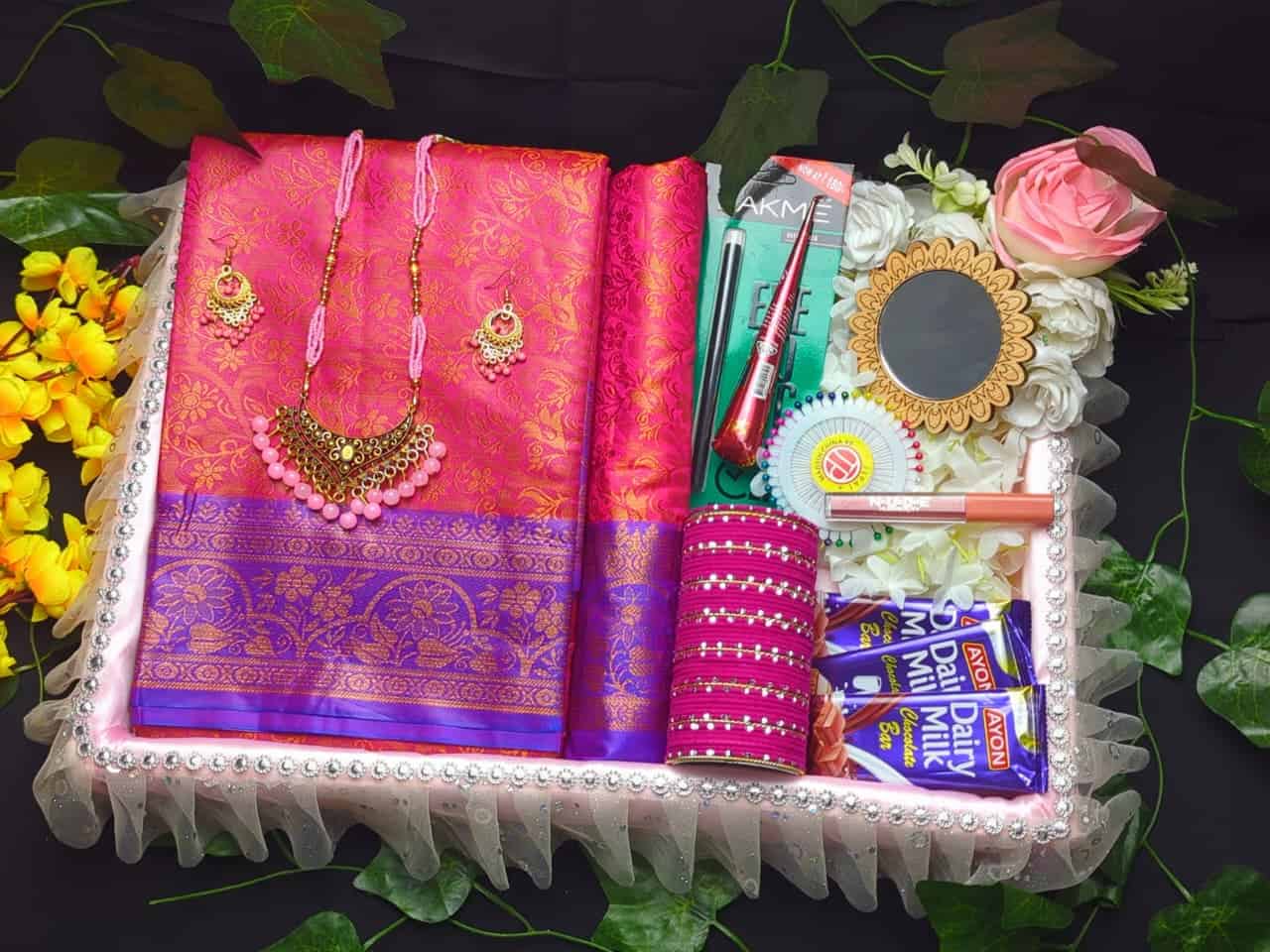 Beautiful Kanchi Boron saree with matching jewelry and accessories for special celebrations.