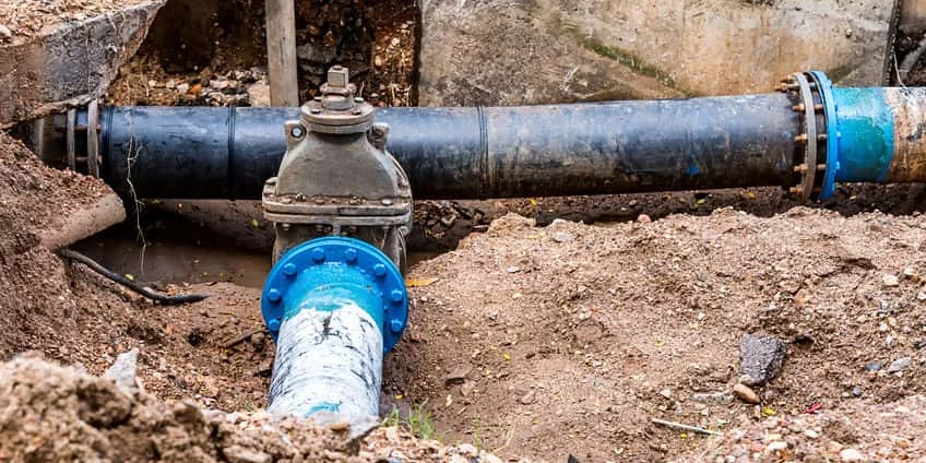 Plumber Fixing Water Pressure by Sheet Happens Plumbing & Drain