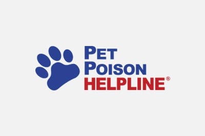 Logo of the veterinarian poison helpline featuring a blue paw print with the words "pet poison helpline" in red and blue text.
