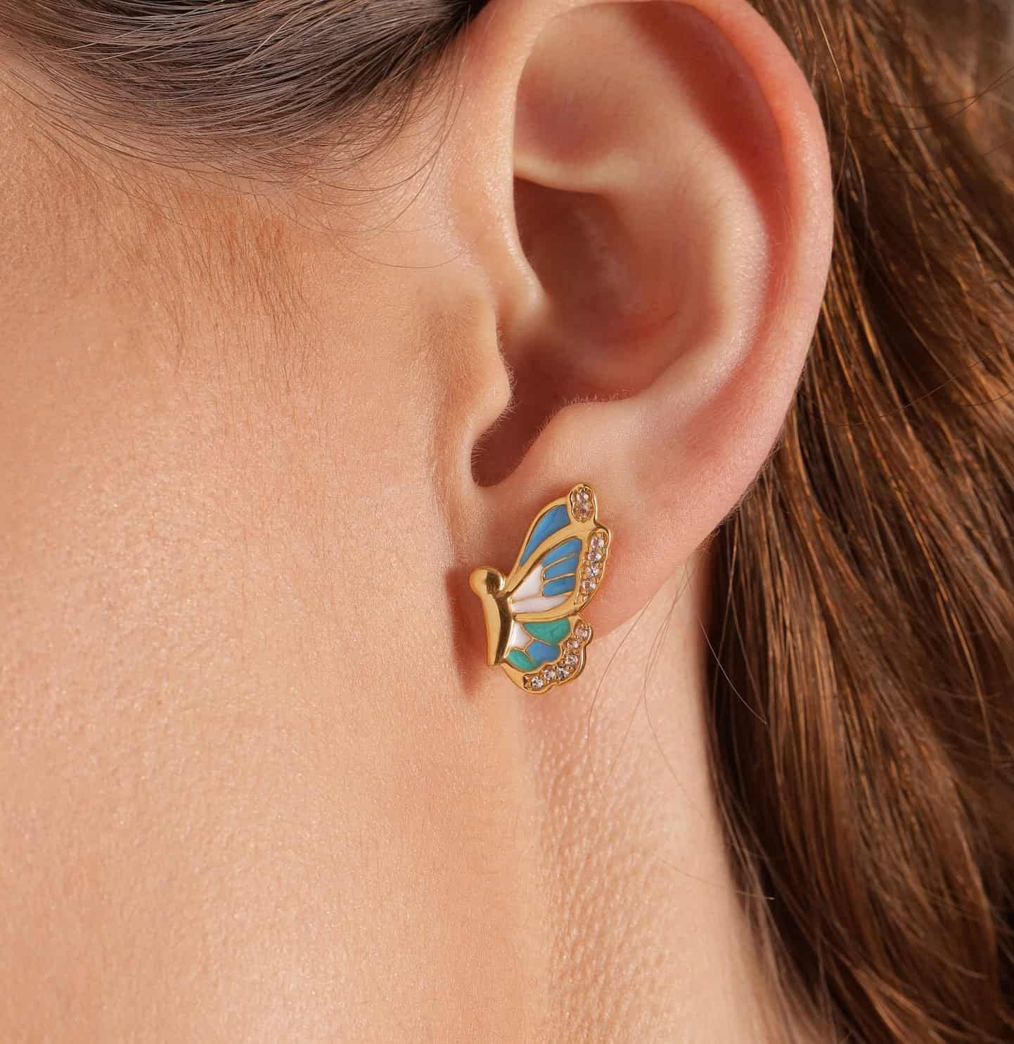 Sterling silver butterfly earring with blue enamel and gold details, perfect for women and teens.
