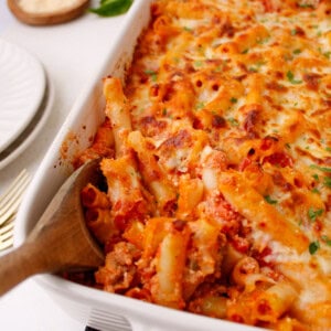 Easy Baked Ziti with Italian Sausage in 9x13 baking dish.
