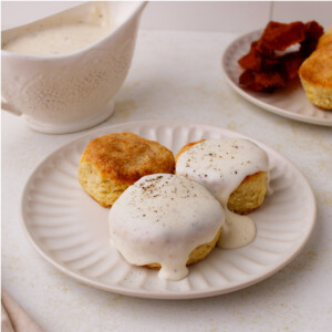 Homemade Country White Gravy on buttermilk biscuits.