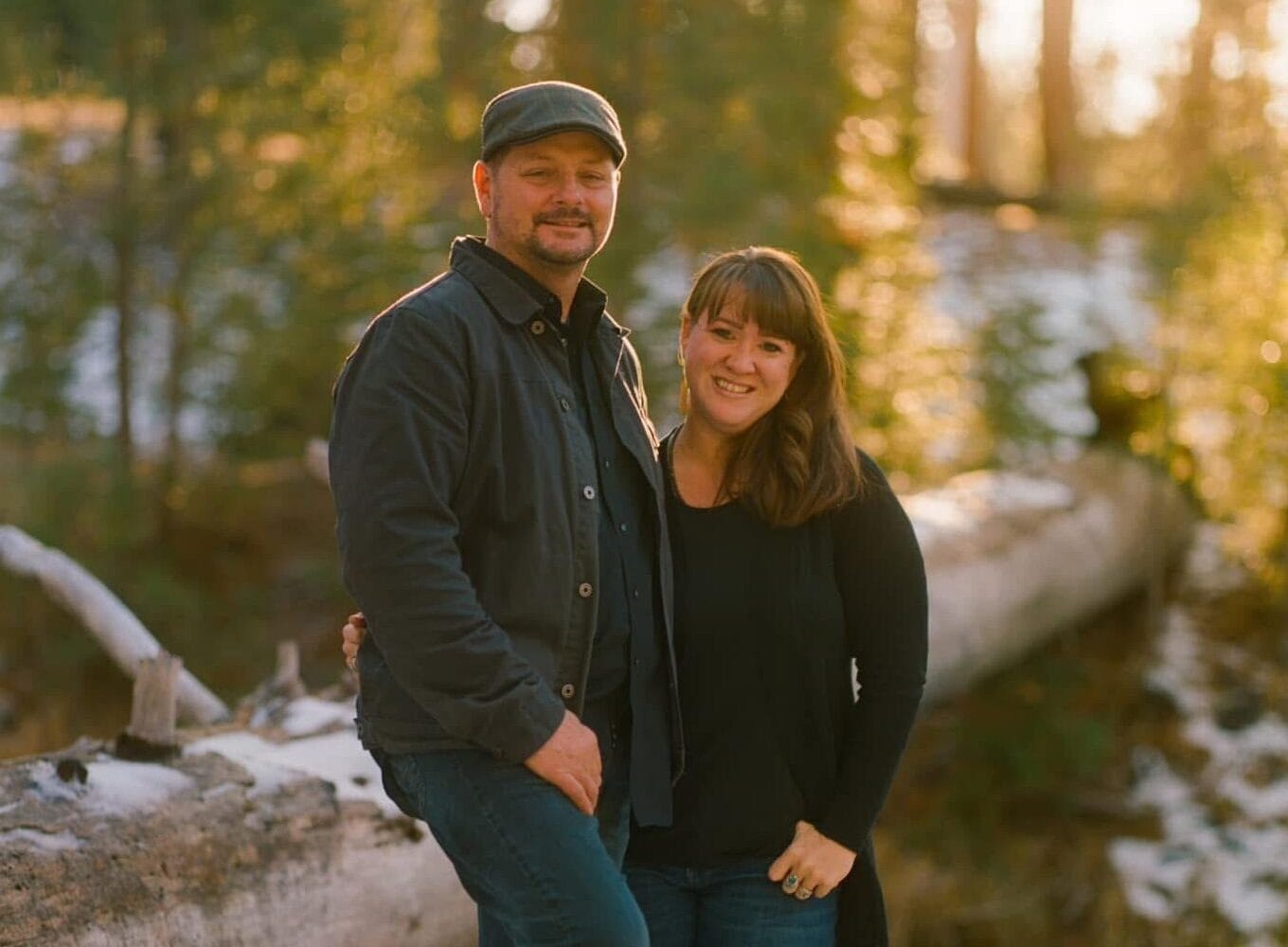 Healing ministry volunteers at Singing Feather Ministries embracing faith and compassion in nature.