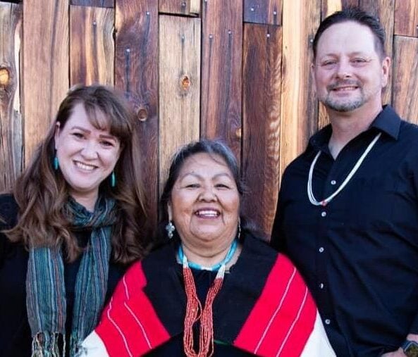 Blessed women leaders at Singing Feather Ministries promoting faith and community.