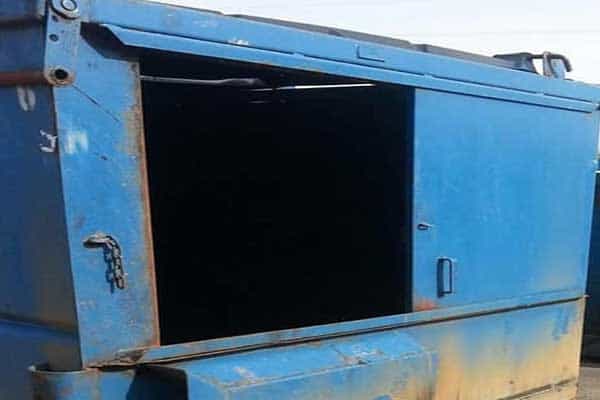 Heavy-duty blue container storage unit for industrial use.