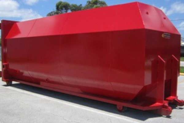 A large red storage container designed for industrial or construction site use.