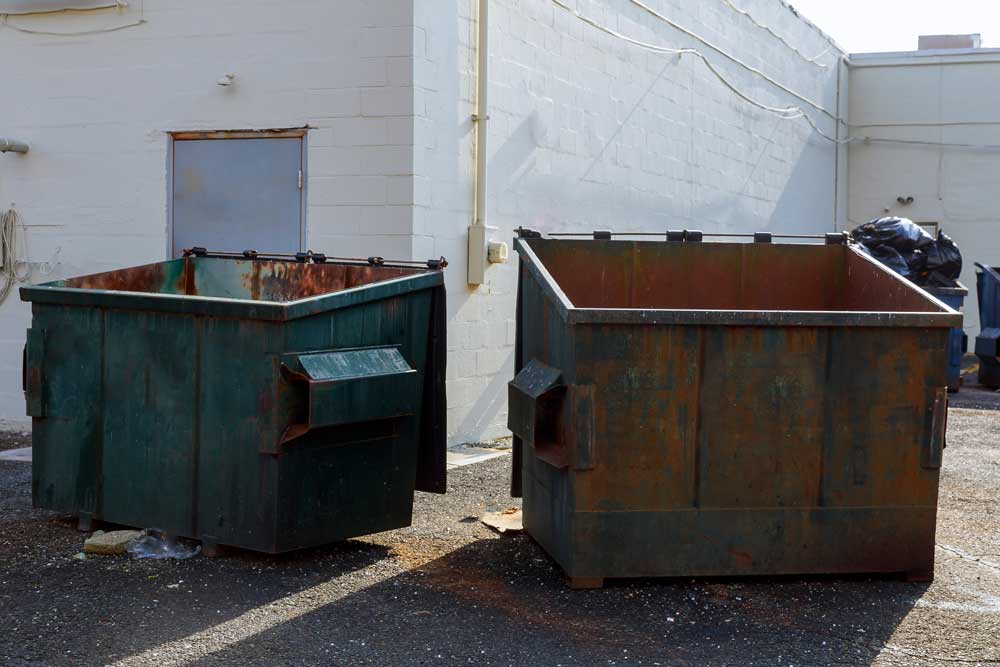 Recycling dumpsters for waste disposal and environmental sustainability.