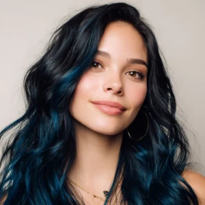 Smiling woman with deep sapphire blue-black hair coloured using Smart Beauty Sapphire Black Hair Dye with Plex Care – vegan, cruelty-free permanent hair colour made in the UK for glossy results