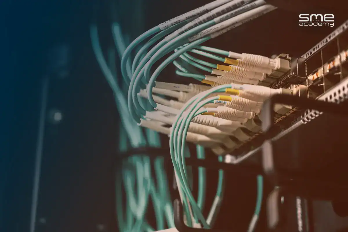 Network cables connected to a server rack in a data center.