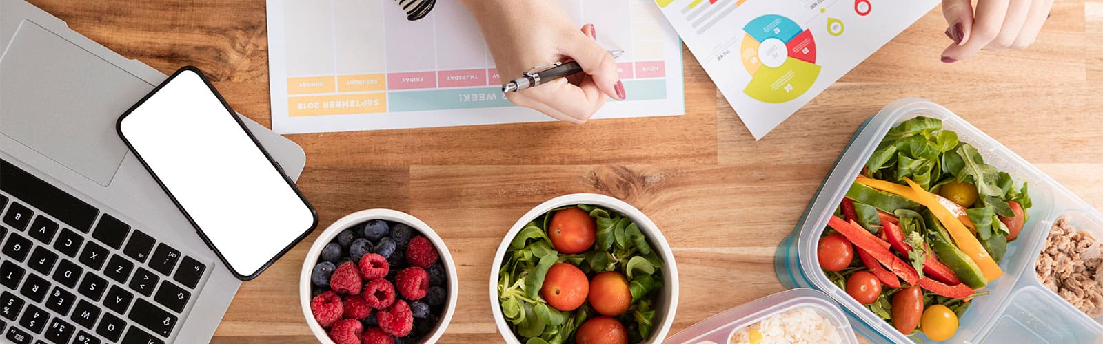 Fresh healthy salads with colorful vegetables and berries for nutritious meal options.