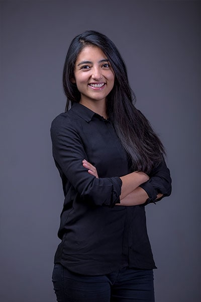 Confident young woman in professional attire for Softlogic Australia.