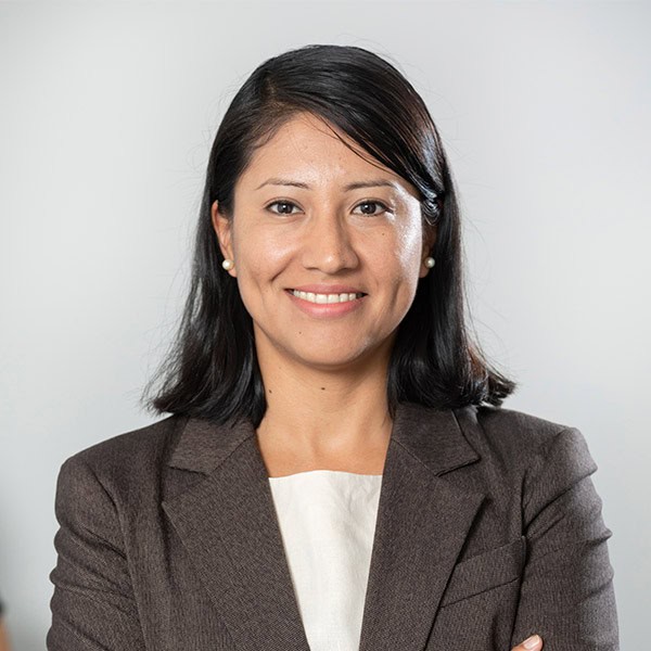 Professional woman in business attire representing Softlogic Australia.