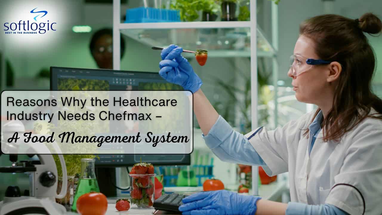 Scientist in a lab coat and gloves examining a strawberry in a lab with food samples and computer screens