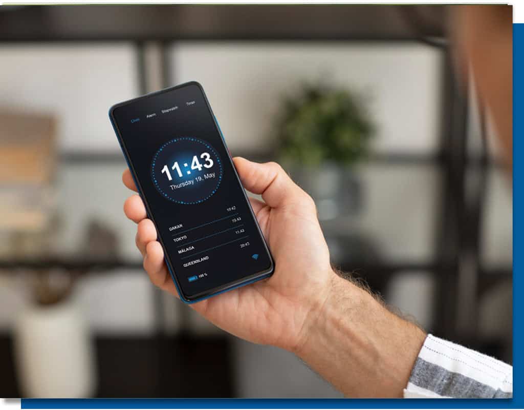 Smartphone displaying time and world clock, representing innovative tech solutions for businesses.