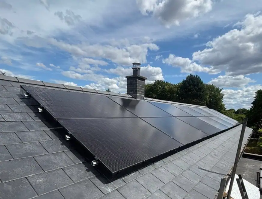 solar insights page High-efficiency solar panels installed on a residential roof for sustainable energy. Perfect for reducing electricity costs and promoting eco-friendly living.