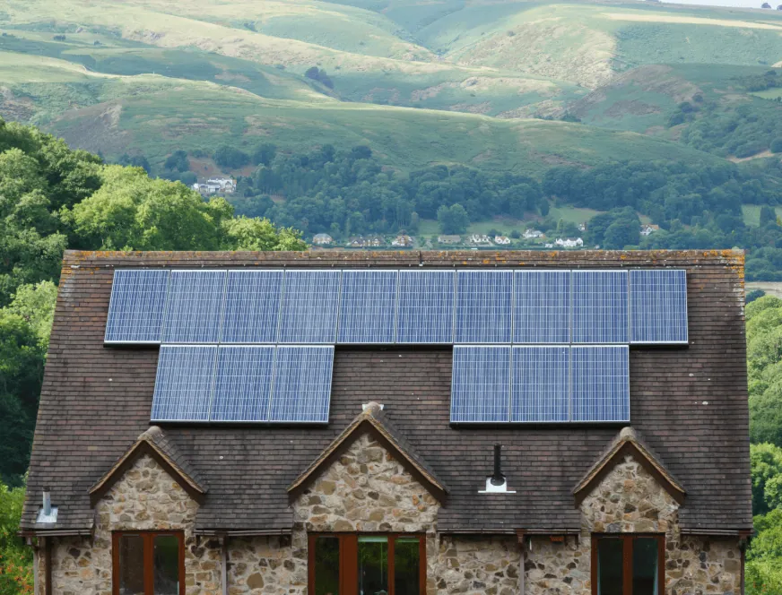 High-efficiency solar panels installed on a residential roof for renewable energy and cost savings. Perfect for eco-conscious homeowners seeking sustainable energy solutions.