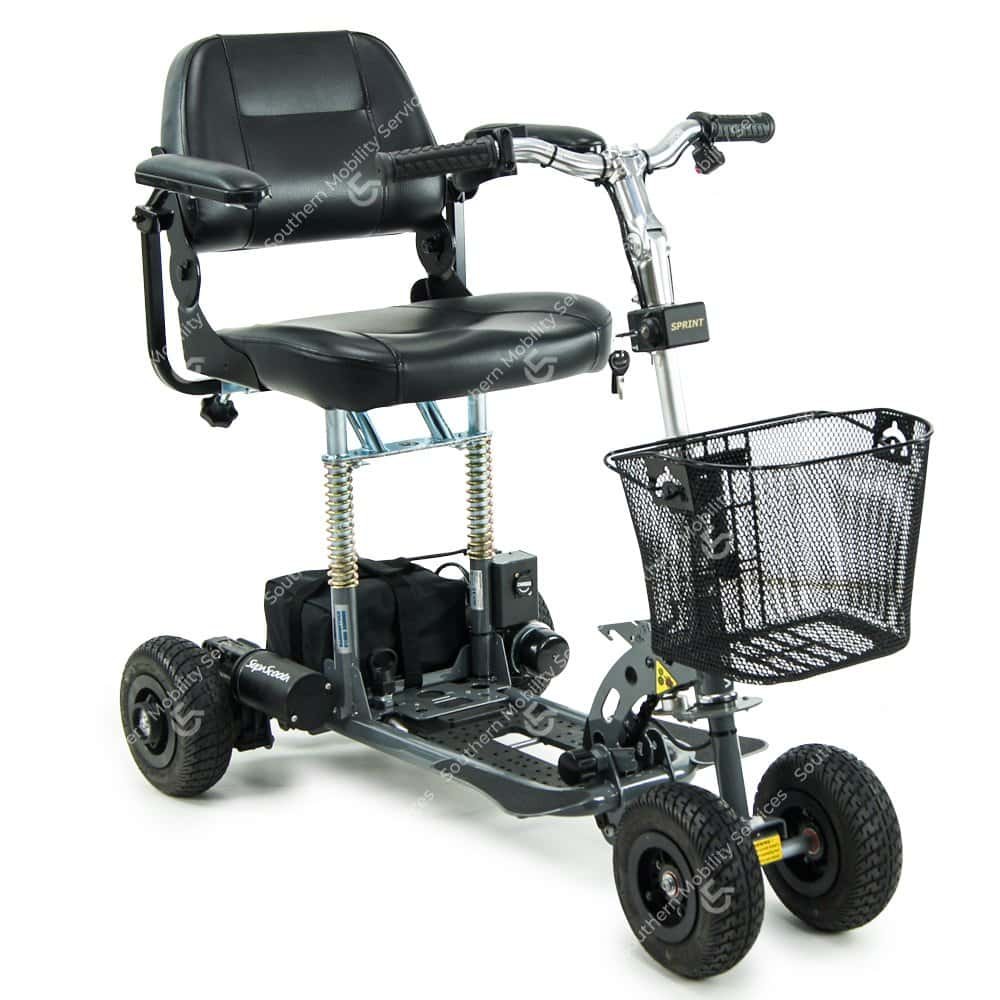 Compact portable mobility scooter with basket.