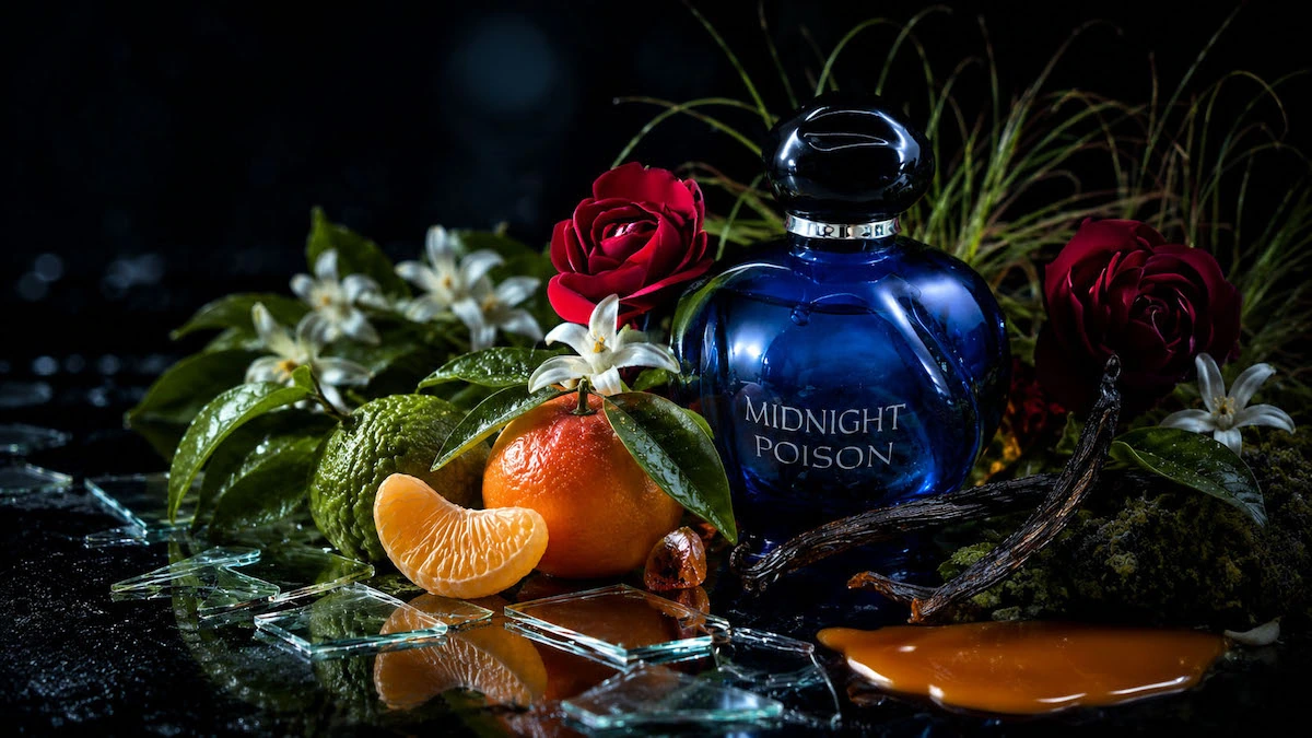 Dior Midnight Poison perfume bottle - sapphire blue glass, dark rose, patchouli, vetiver, oakmoss, amber and vanilla Dior Midnight Poison perfume bottle in deep sapphire blue glass with dark rose and chypre fragrance atmosphere