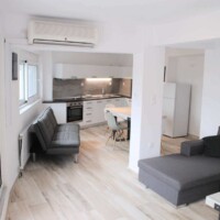 Panorama House – ενιαίος χώρος με καναπέ, τραπέζι φαγητού και κουζίνα, άνετη διάταξη