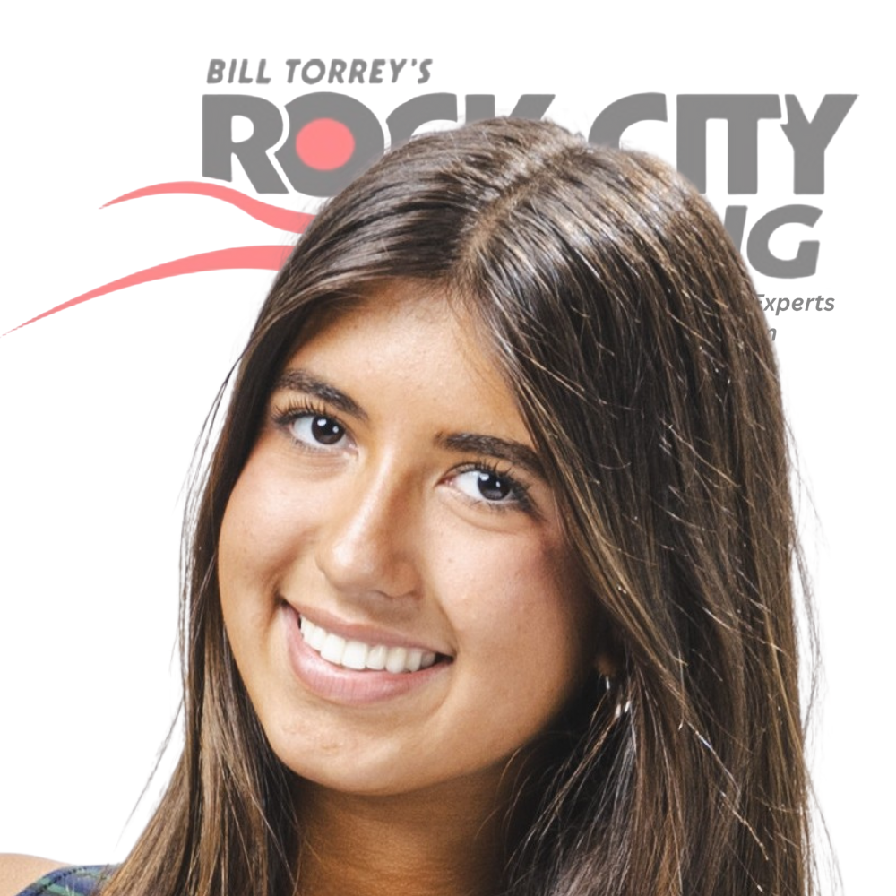 Woman smiling with running shoes, Little Rock sporting goods store, Rock City Running.