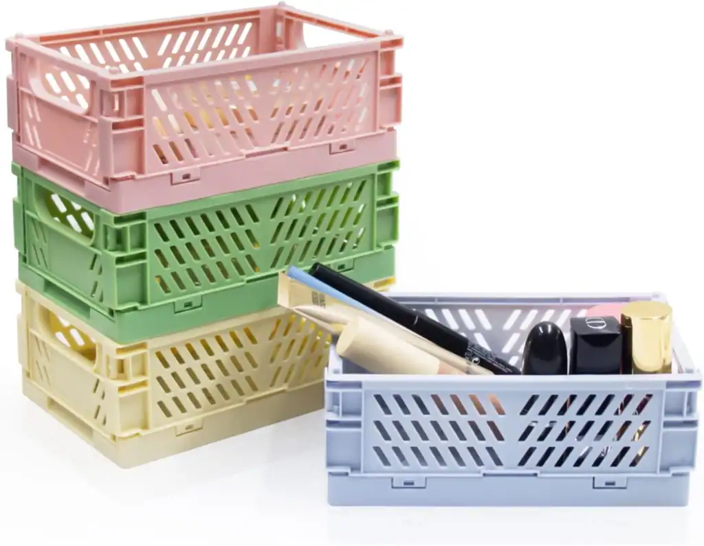 Stacked colorful storage baskets for dorm room organization and small space hacks.
