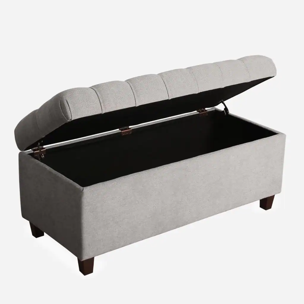 Storage bench for small dorm rooms with lid open for organization.