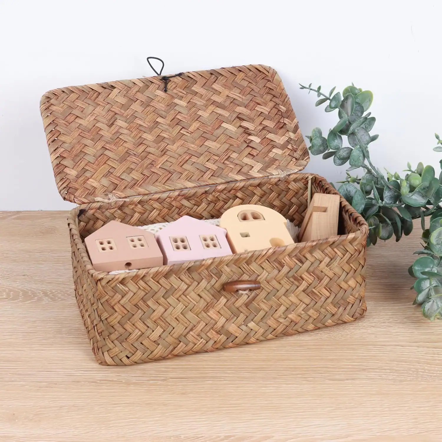 Efficient power strip storage in a woven basket for small dorm room spaces.